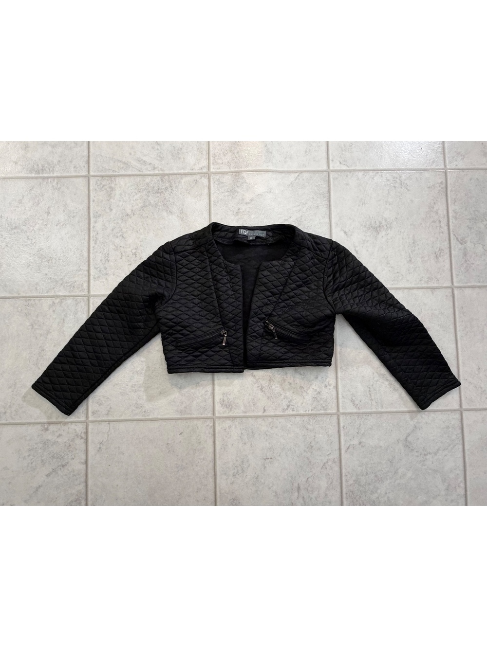 TQF Collection black quilted shrug